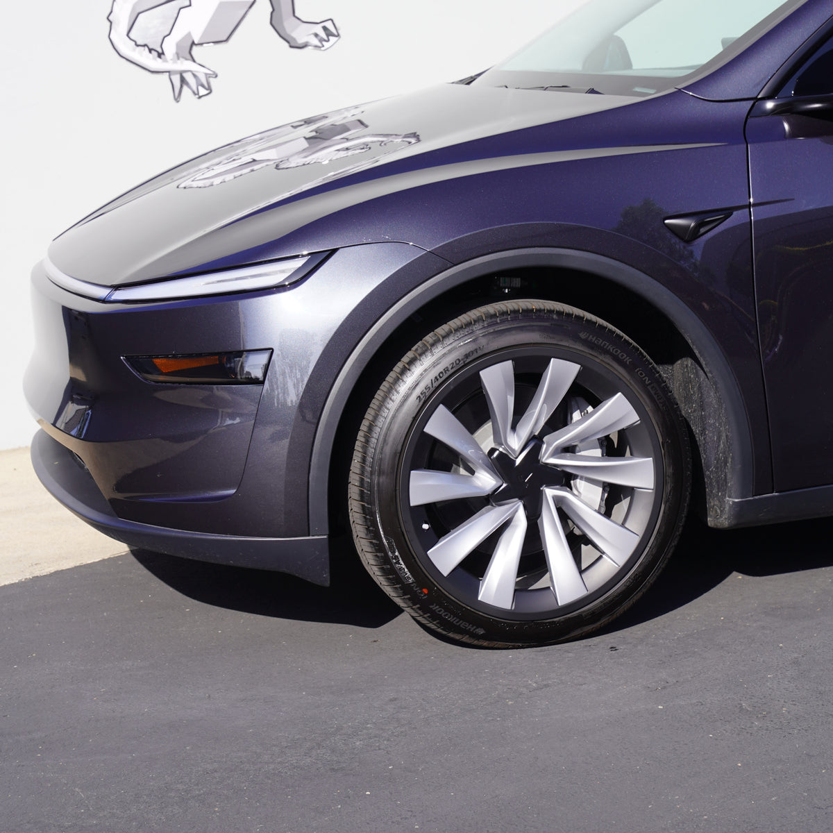 TESPLUS Helix 2.0 rim protector in black on a Model Y